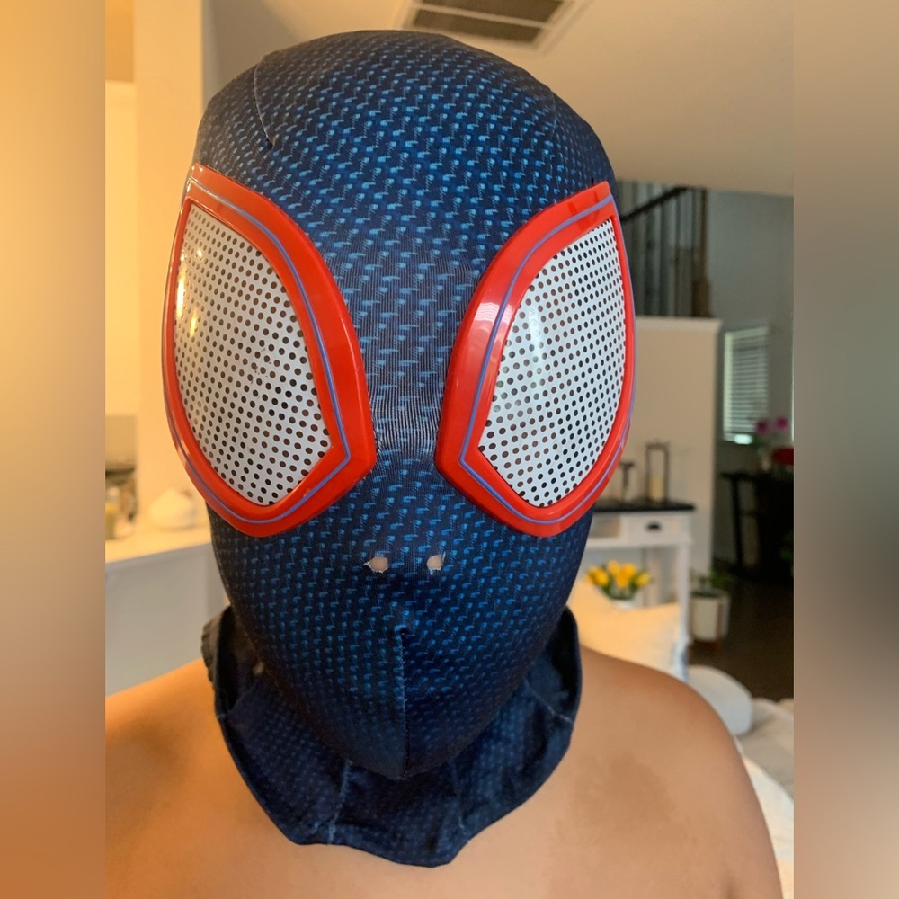 Blue and Red Spider Mask and costume.
Size child L (12-14)